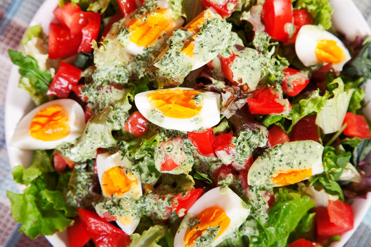 Summer salad with tomatos and boiled eggs