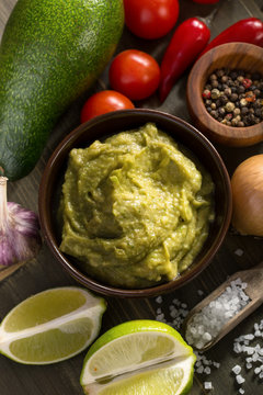 Fresh guacamole sauce and ingredients