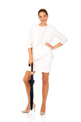 Fototapeta premium Blonde businesswoman holding an umbrella