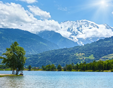 Lake Passy and Mont Blanc mountain massif summer view.