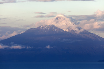 Fototapeta premium Osorno Volcano seen during the sunset from Puerto Varas