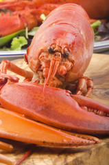 boiled lobster on wooden board