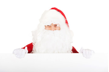 Santa Claus holding white blank sign