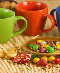 image of cups and different sweets closeup