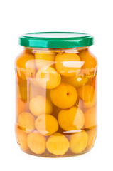 Glass jar with preserved apricots