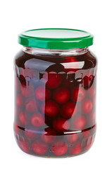 Glass jar with preserved cherries
