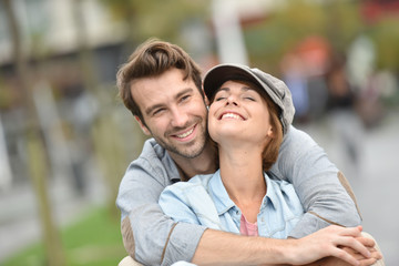 Fototapeta premium Portrait of in love young couple in town