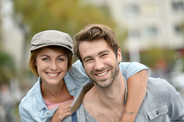 Portrait of cheerful young couple