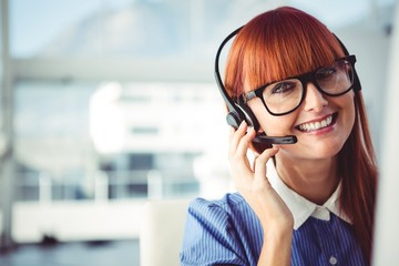 Attractive hipster woman with headset 