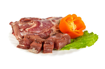 semi-finished products made of wild boar meat on the plate, isolated