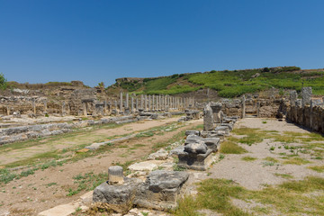 Fototapeta na wymiar Ancient ruins of Perge. The colonnaded street. Turkey