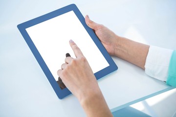 Businesswoman using her tablet pc