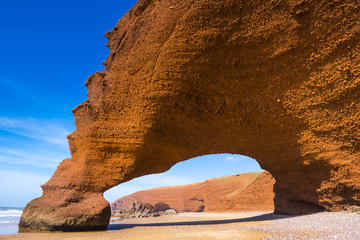 Fototapeta na wymiar Sandstone arch on Legzira beach, Morocco