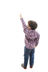 Back view of little boy points at wall. Rear view. Isolated on white background 
