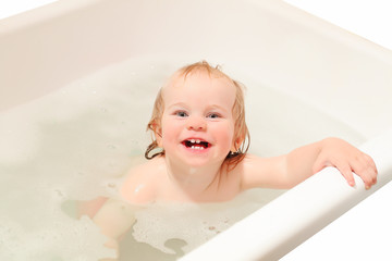 kid laughing in the bathroom