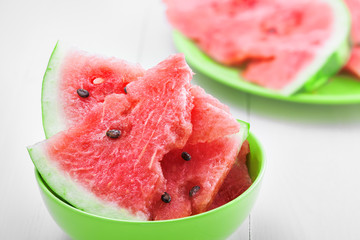Slices of watermelon on white table