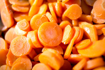 sliced with a sharp knife into pieces fresh and organic Carrot