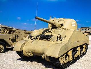 Fototapeta na wymiar Old Sherman Tank M4A3 with 105mm fire support. 