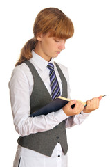 Schoolgirl reading a textbook