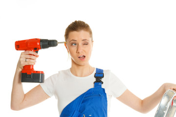 strong funny woman in coverall with drill