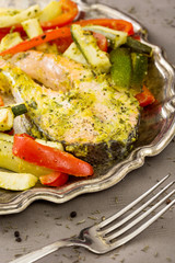 piece of baked fish and vegetables