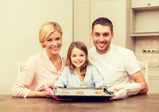 Happy Family Making Cookies At Home