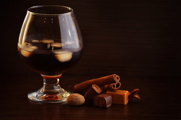 Glasses of whiskey rum with ice cubes
