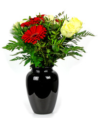 bouquet of flowers in a vase on a white background