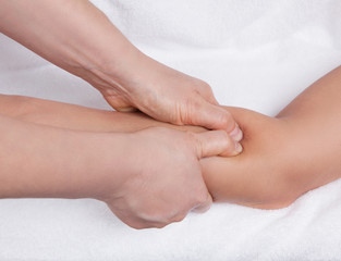 Acupressure point and massage treatment on a forearm