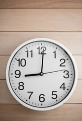 wall clock on wood