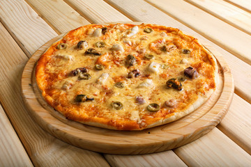 Seafood pizza. With shrimps, mussels and olives