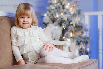 Obraz na płótnie Canvas Happy girl near Christmas tree.