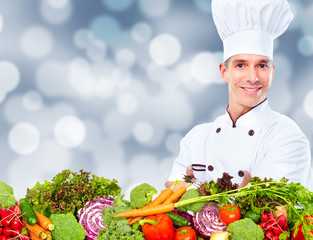 Chef man with vegetables.