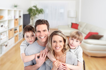 Obraz premium Happy family in a new house.