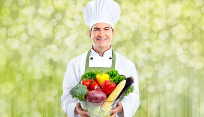 Chef man with vegetables.