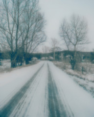 Obraz premium winter landscape road in the village
