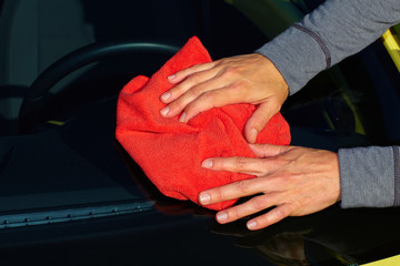 Car with wax and polish cloth.