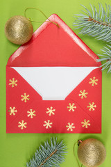 red envelope on green background, christmastime