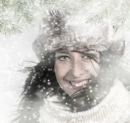  Beauty young girl on the winter background.