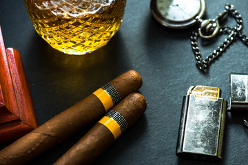 Cuban cigars with cognac and humidor