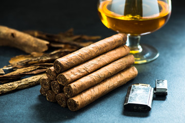 pile of authentic cuban cigars