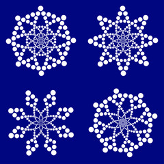 white snowflakes on dark blue background