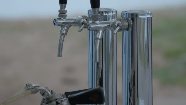 The silver faucets on the fod or small port. The faucet is used for drinking water in the fod