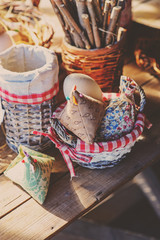 rustic easter decorations on wooden table in cozy country house, selective focus
