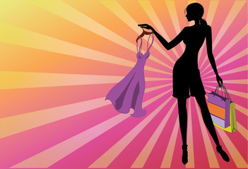 Silhouette fashion girl with a dress in the hands