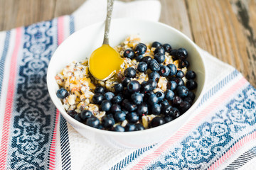 oatmeal with poppy seeds, blueberries and honey, breakfast,selec
