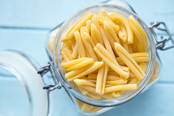 uncooked pasta caserecce in jar