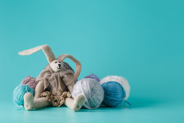 Cozy doll with colored clew