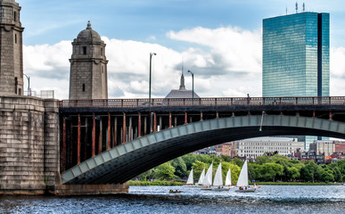 Boston historic Longfellow Bridge framing a view of sailboats on the Charles River