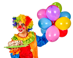 Obraz na płótnie Canvas Happy birthday clown holding a bunch of balloons. 